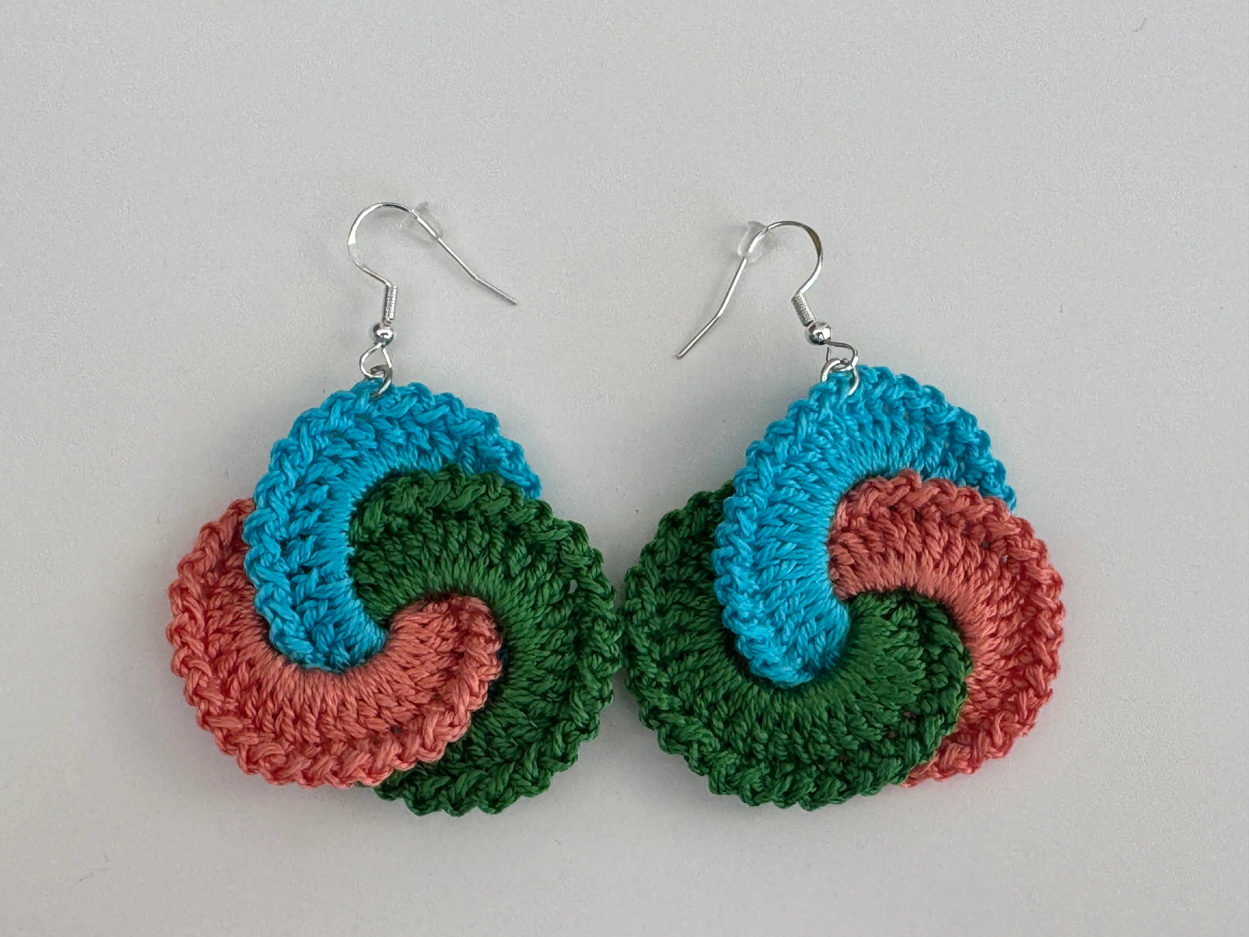 KUMAI Swirl Drops - Coral Grove flat-lay